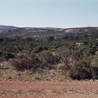 Površinski kopovi - izmjena pejzaža gledano sa puta prema bazenima